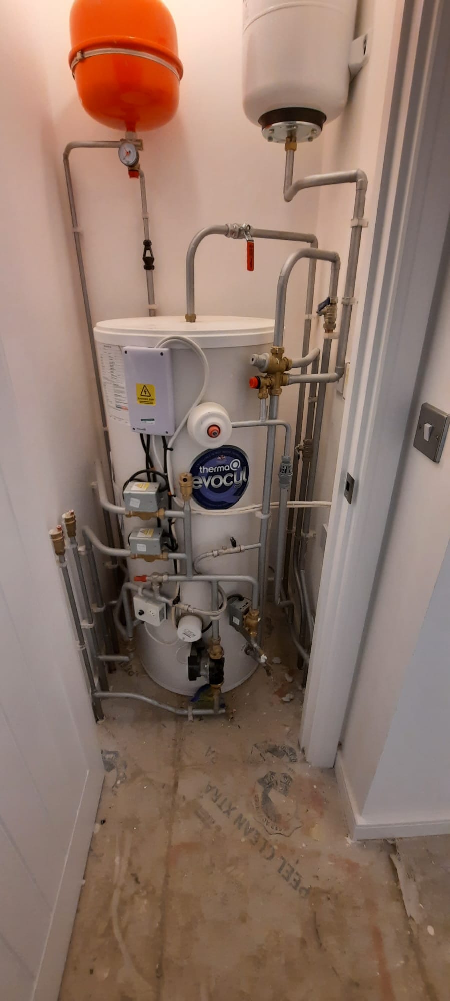 Unvented hot water cylinder installation in an airing cupboard in Chatham